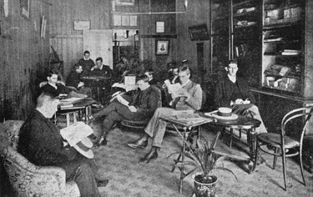 512px-statelibqld_2_295847_relaxing_in_the_members27_lounge_of_the_young_men27s_christian_association2c_1906